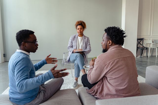 person speaking with two parties